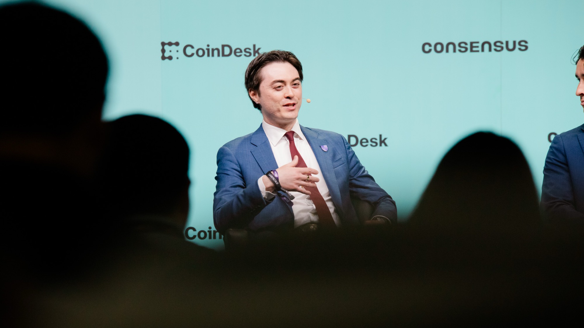 Mason Lynaugh speaking on a panel at Consensus Miami